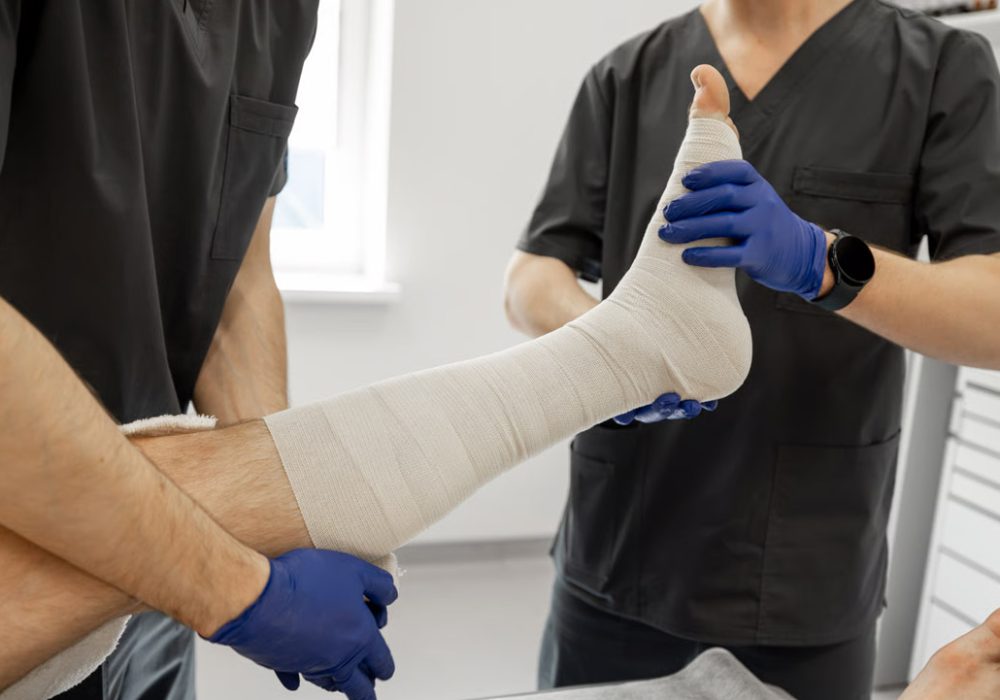 Doctor examining anatomical model of human body.